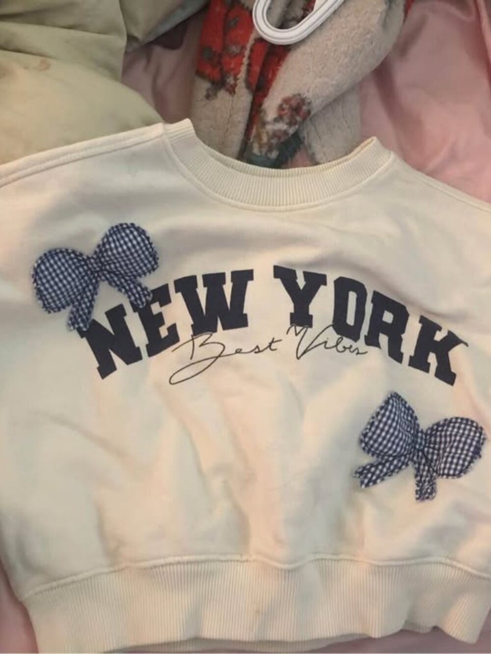 Cream New York Graphic Sweatshirt with Gingham Bows